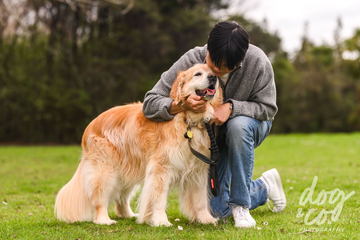 Don giving Lucky a cuddle in the park