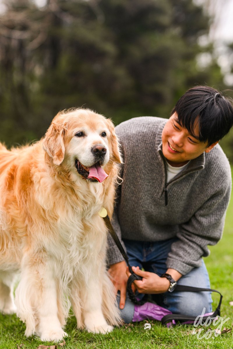 Don smiling next to Lucky